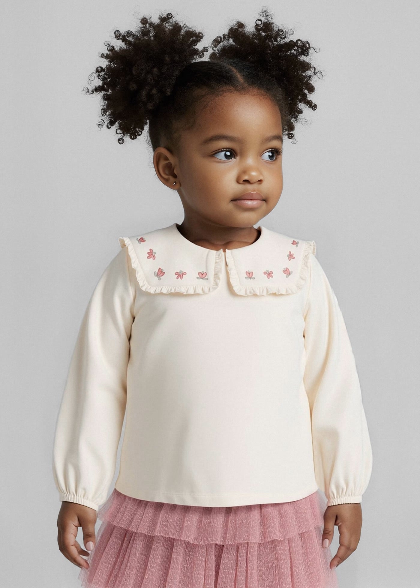 Blusa cuello volante niña