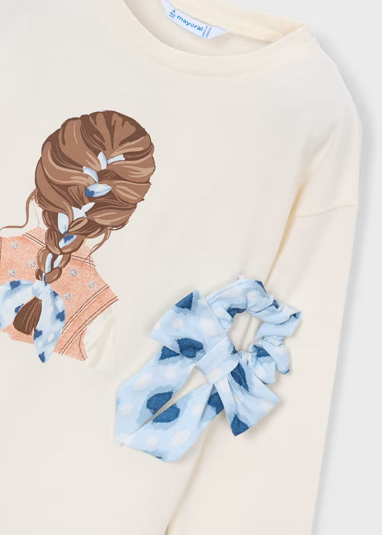 Camiseta de manga larga con coletero niña