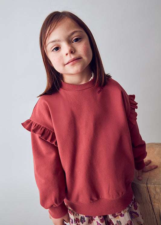 Pullover volante mangas