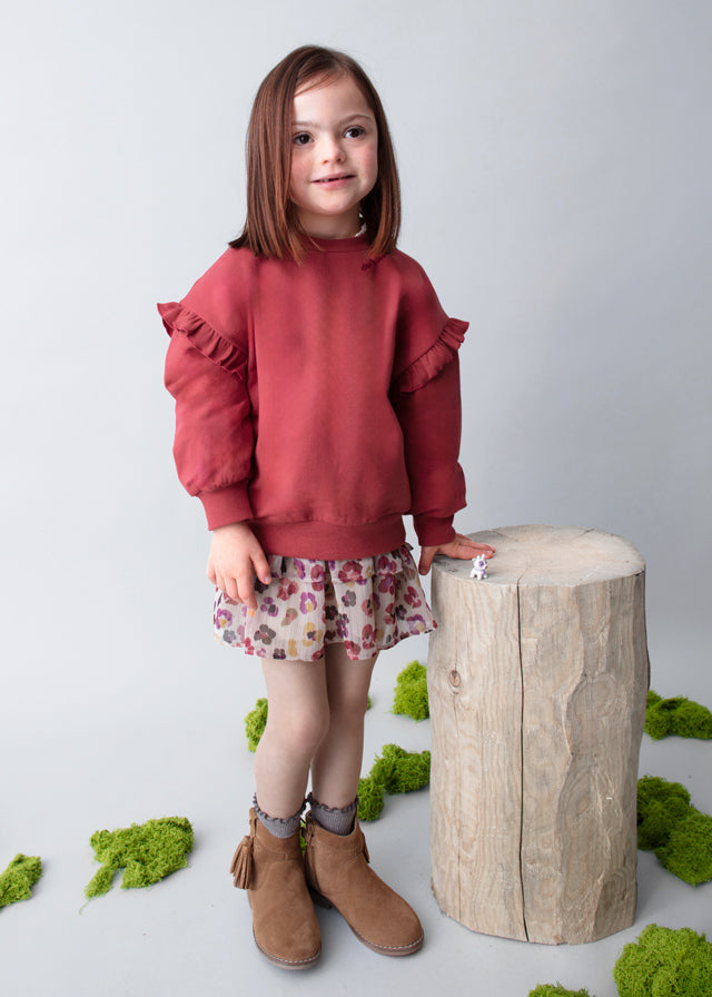 Pullover volante mangas