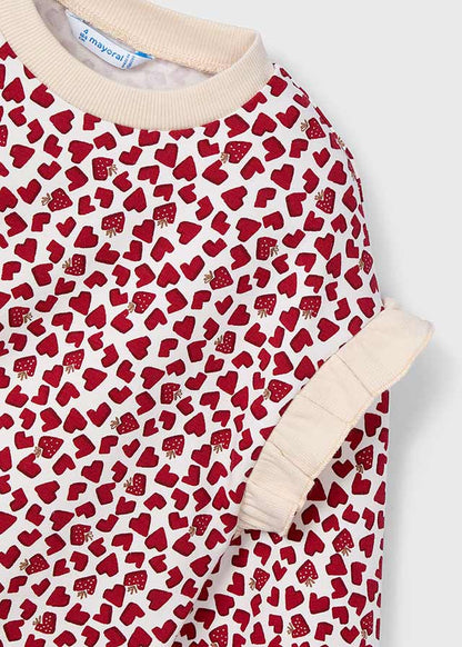 Pullover volante mangas