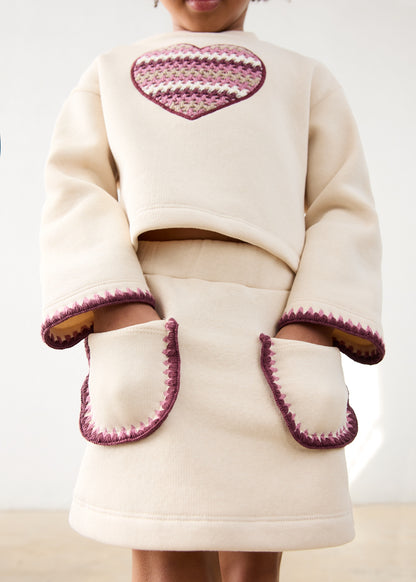 Conjunto falda y sudadera corazón niña
