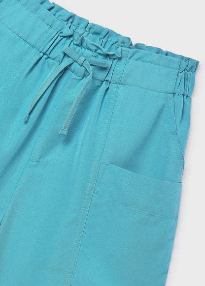 Pantalón corto bolsillos chica