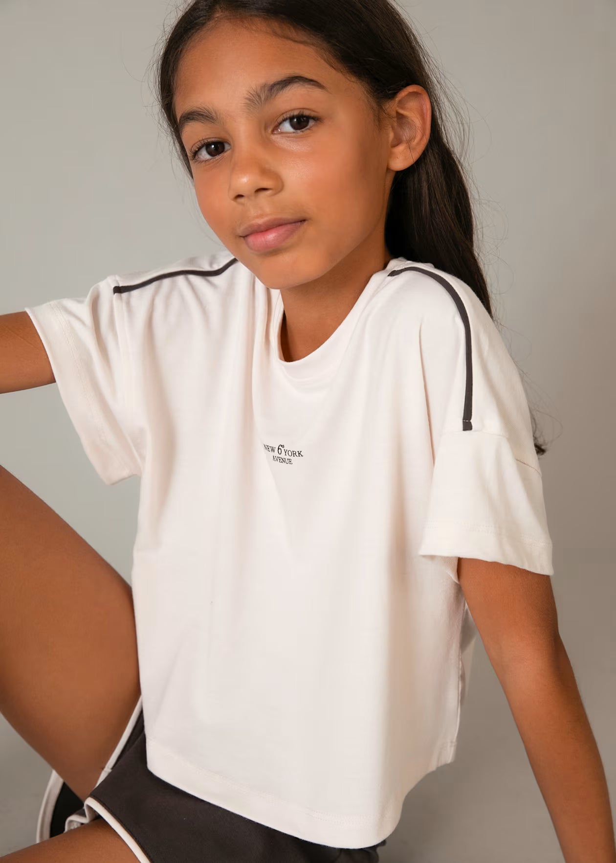 Conjunto pantalón corto y camiseta punto chica