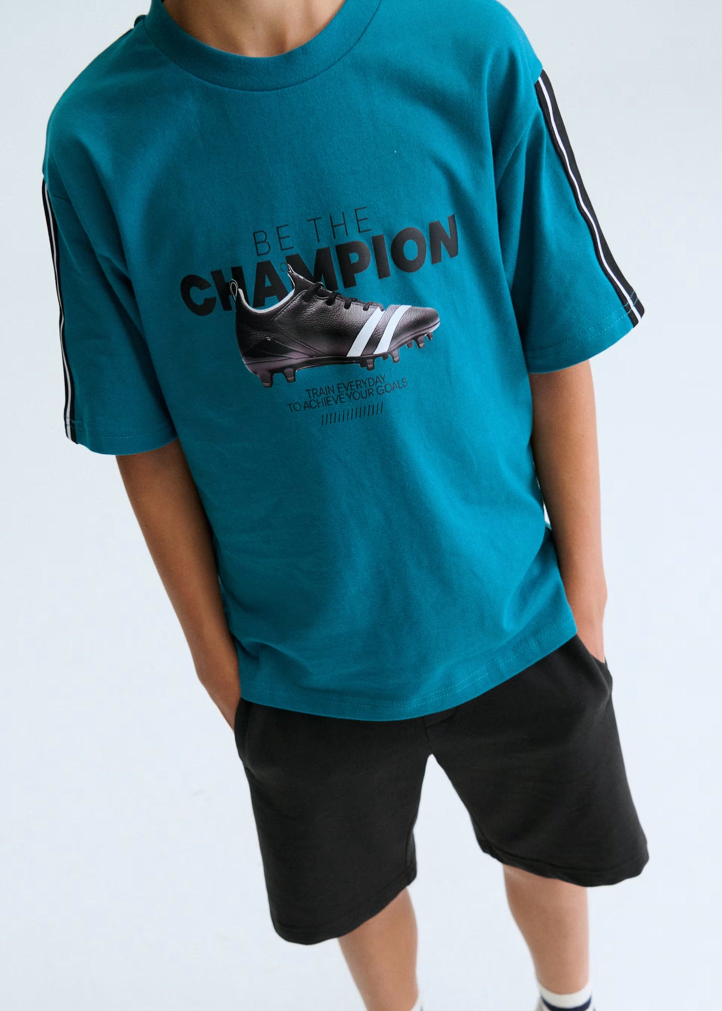 Conjunto bermuda y camiseta bota de fútbol chico