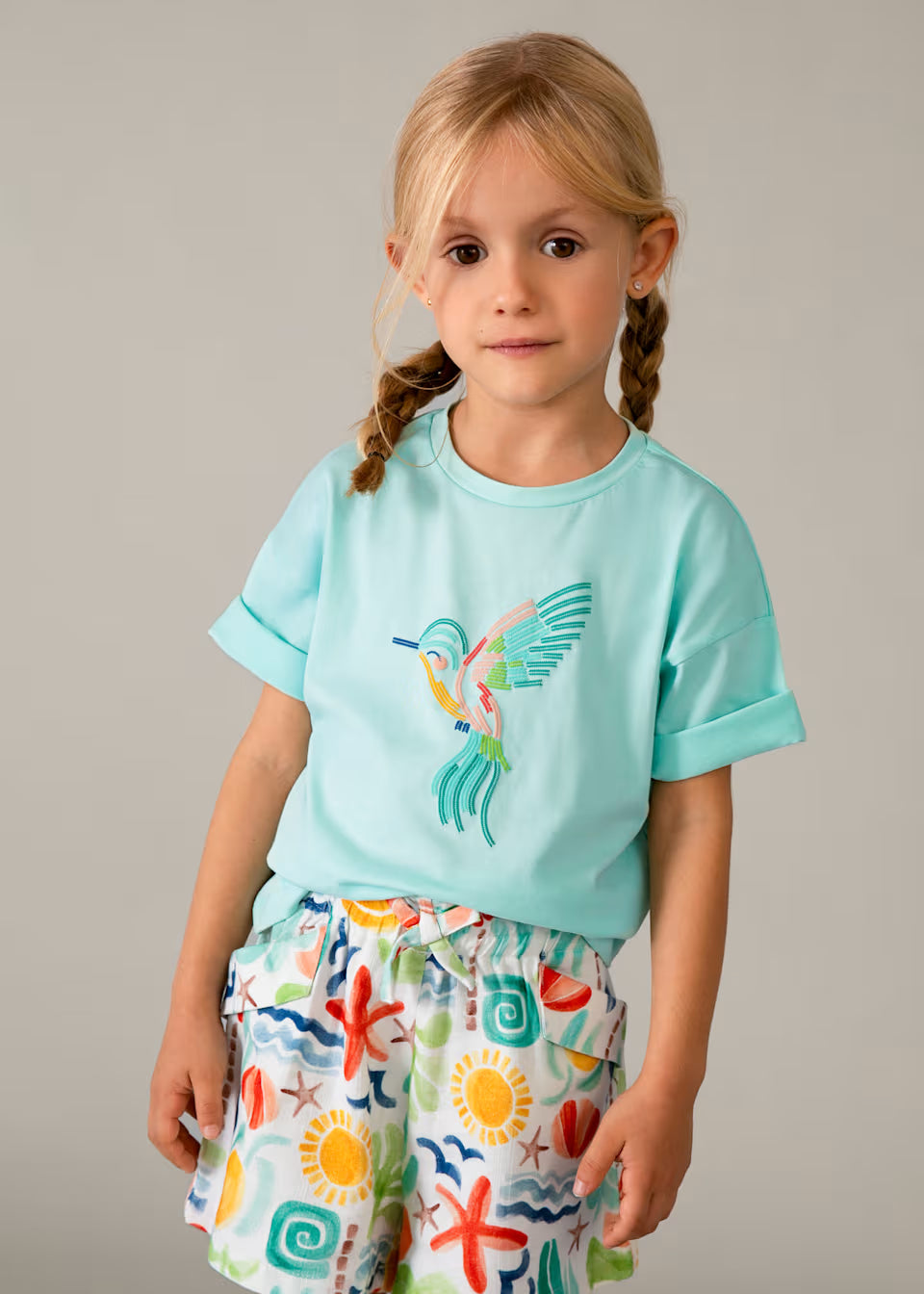 Camiseta hombro caído niña