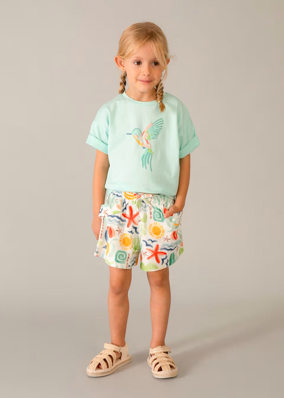 Camiseta hombro caído niña