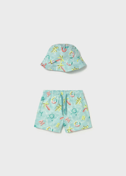 Conjunto bañador y gorro reversible protección solar bebé