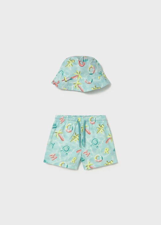 Conjunto bañador y gorro reversible protección solar bebé