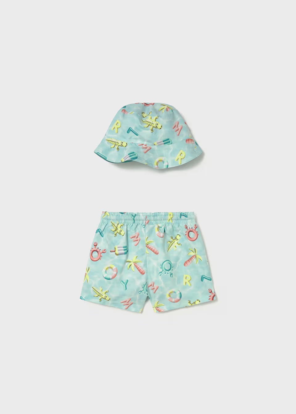 Conjunto bañador y gorro reversible protección solar bebé