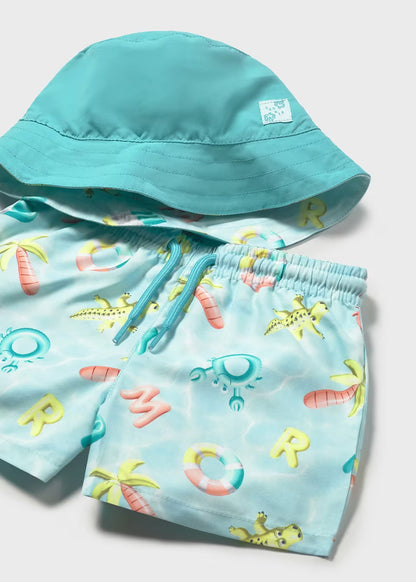 Conjunto bañador y gorro reversible protección solar bebé