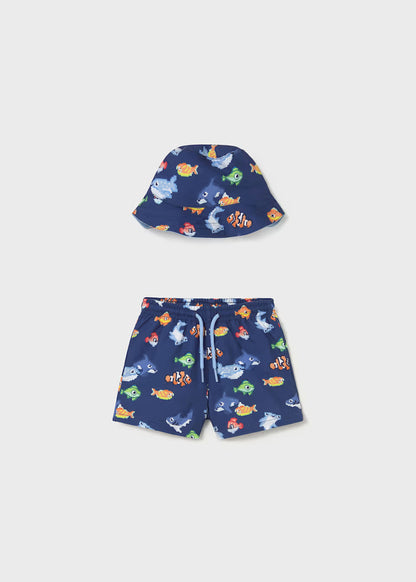 Conjunto bañador y gorro reversible protección solar bebé