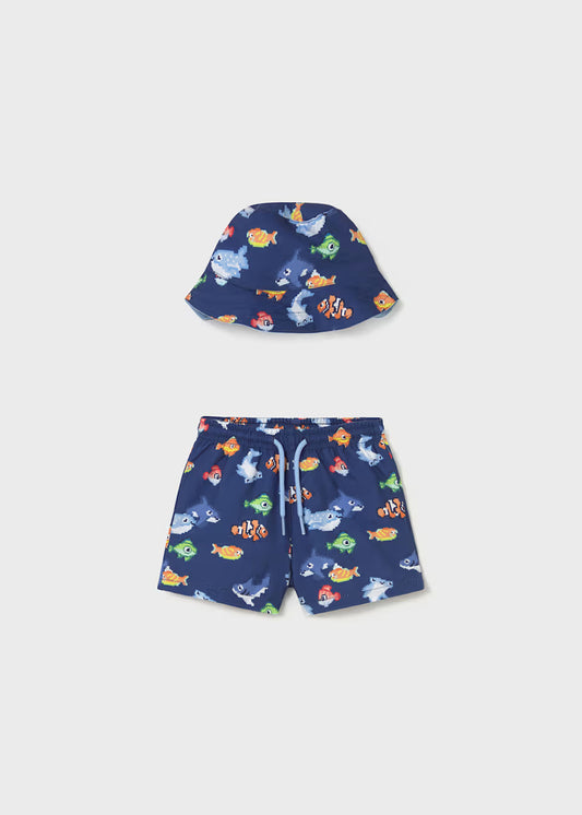 Conjunto bañador y gorro reversible protección solar bebé
