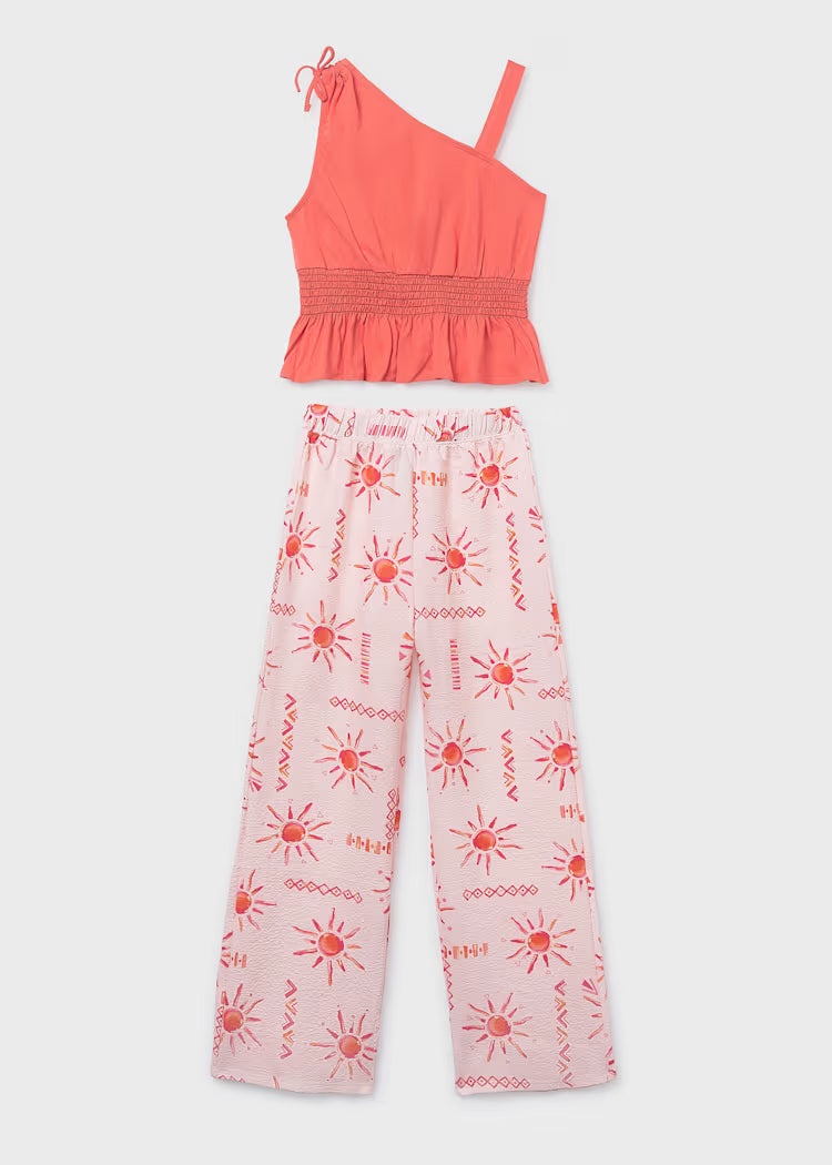 Conjunto de pantalón largo estampado y top chica
