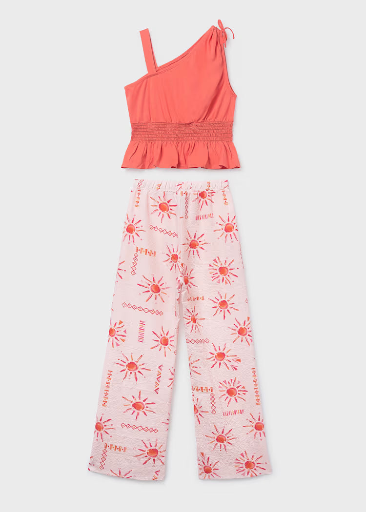 Conjunto de pantalón largo estampado y top chica