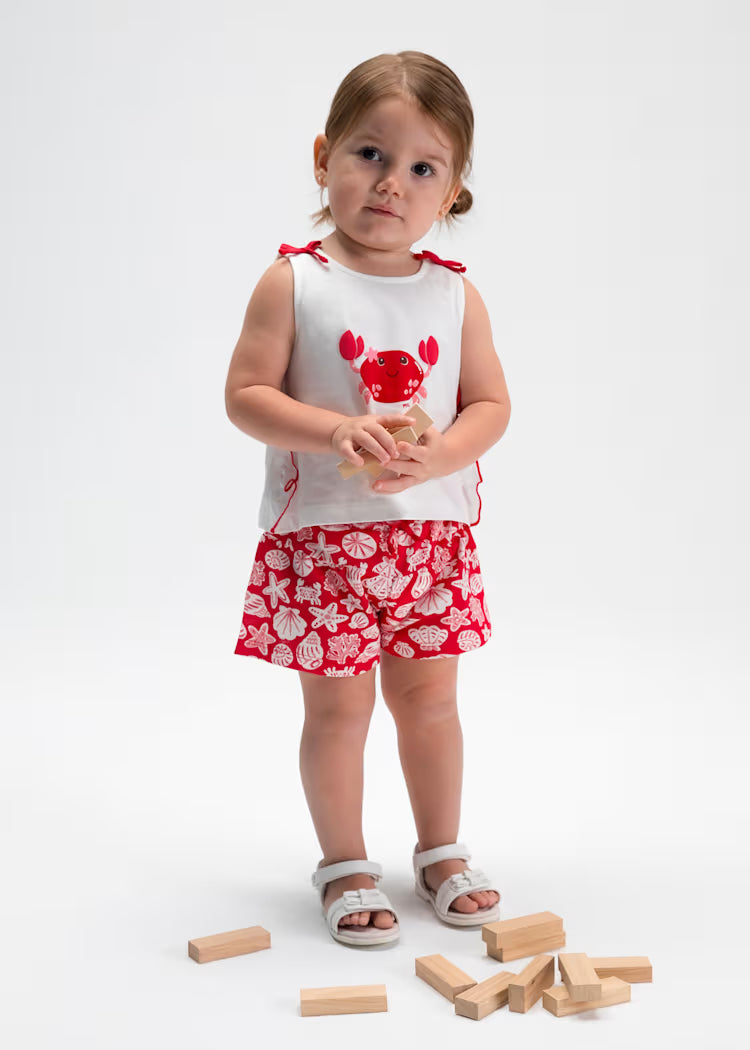 Conjunto pantalón corto estampado y camiseta bebé