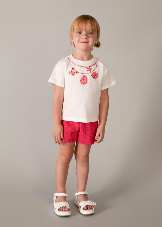 Conjunto pantalón corto volantes y camiseta estampada niña