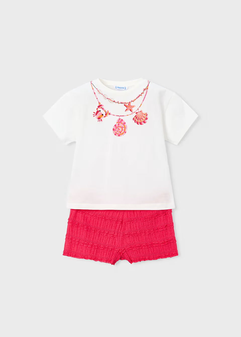 Conjunto pantalón corto volantes y camiseta estampada niña