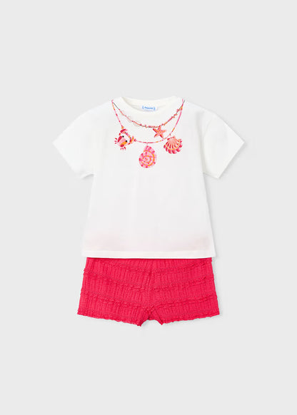 Conjunto pantalón corto volantes y camiseta estampada niña