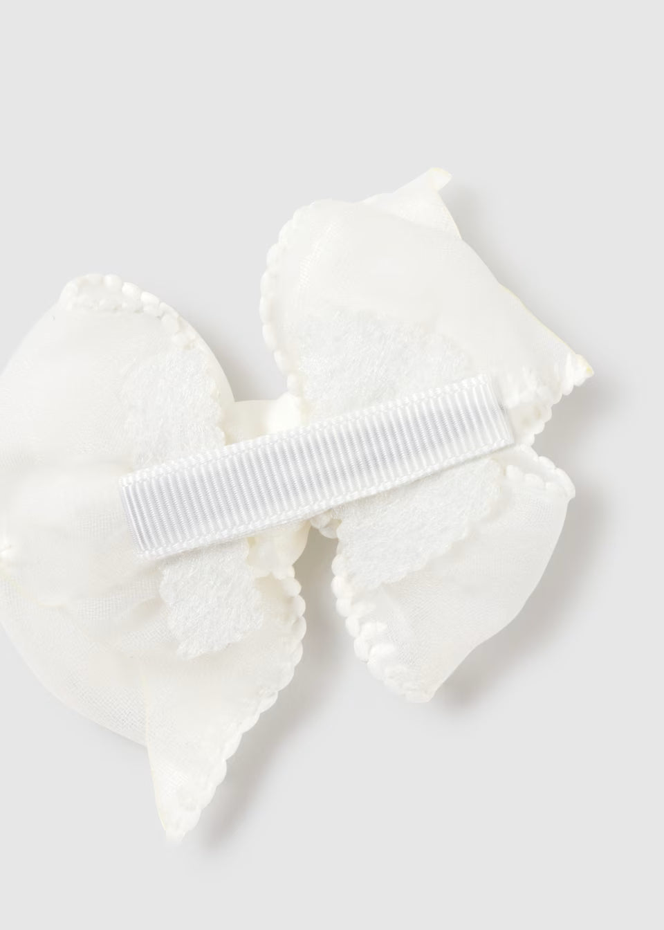 Diadema elástica con pinza lazo recién nacida