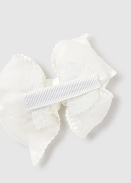 Diadema elástica con pinza lazo recién nacida