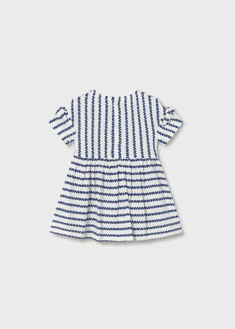 Vestido estampado con bolso bebé